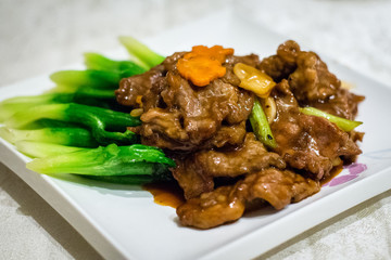 Stir fry australian beef with ginger and asparagus in savoury sauce