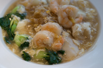 Cantonese Style Seafood Hor Fun with flat rice noodles, shrimp, vegetables