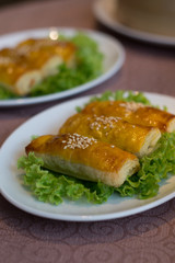 Baked Barbeque Chicken Puff Chinese Dim Sum on lettuce