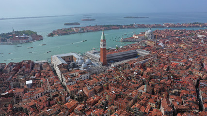 Aerial drone photo of iconic and unique Campanile in Saint Mark's square or Piazza San Marco, Venice, Italy