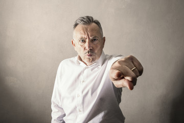 man by Stern and angry look