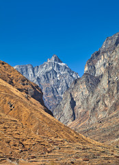 Himalayan brown and yellow mountains with blue sky near Badrinath