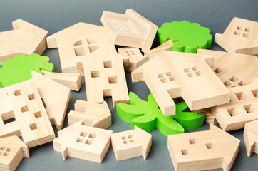 Many felled wooden houses. Destruction of houses as a result of natural disaster. The flood....