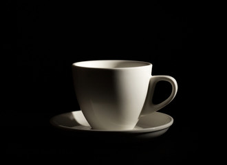 Fragrant coffee on a black background for your advertising. Smoke from hot coffee.