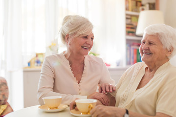 Senior woman spending quality time with her daughter