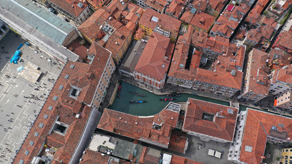 Aerial drone photo of famous Gondola station next to Saint Mark's square in Venice, Italy