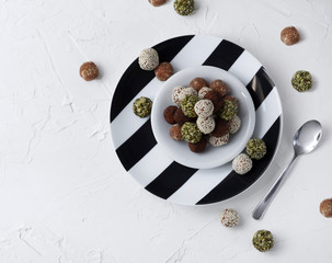 Eco homemade dessert. Sweet raw balls of dried fruits and nuts.