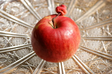 big and small apple. big red apple with little baby apple