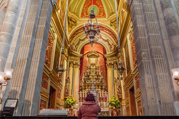 Fototapeta premium Braga, Portugal - December 28, 2017: Se de Braga Cathedral interior. Colorful baroque chapel. Oldest Cathedral in Portugal. 11th century Romanesque with Gothic and Baroque adding