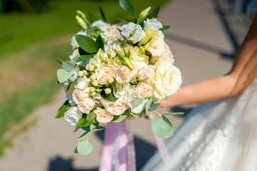 Bride holding flower bouquet