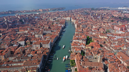 Fototapeta premium Aerial drone panoramic photo of iconic and unique Grand Canal crossing city of Venice as seen from high altitude, Italy