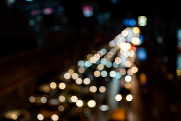 light night city bokeh abstract background glittering stars on bokeh. Orange bokeh in the bottom of the picture. Has a black background- Image