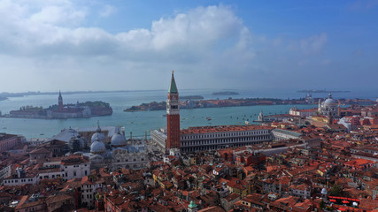 Aerial drone photo of iconic and unique Campanile in Saint Mark's square or Piazza San Marco,...