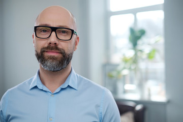 Fototapeta premium Bearded middle-aged man wearing glasses.