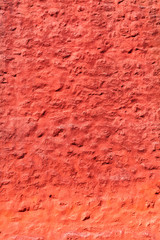Old red weathered rough wall texture background