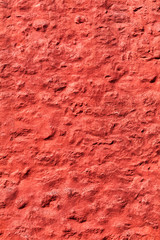 Old red weathered rough wall texture background