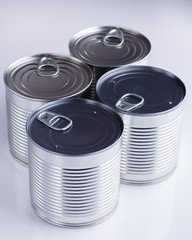 Canned corn in a iron can on white background