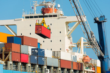 Cargo ship being loaded at the port of Iquique, Chile