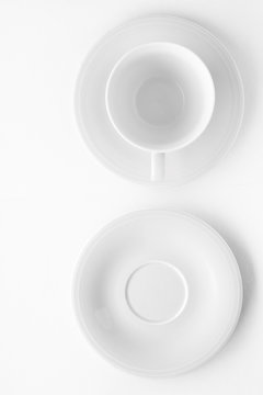 Empty cup and saucer mockup on white background, flatlay