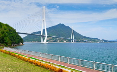 Nishiseto Expressway connects Onomichi, Hiroshima and Imabari, going through nine of the Geiyo Islands. It contains fifty-five bridges,  is famed for its scenic views and can be crossed by bicycles
