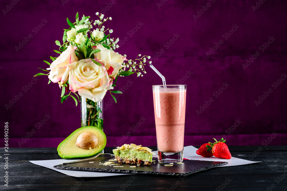 Poster strawberry smoothie and avocado tart. healthy foods or dessert concept.