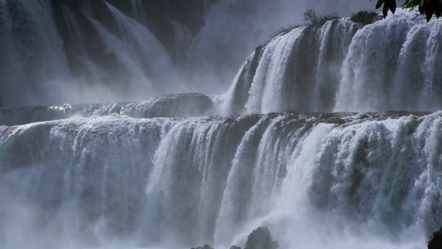 Bangioc waterfall in Vietnam and Detian waterfall in China, located near border, people can see this waterfall both of country. , Zoom out.
