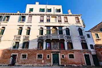 Naklejka premium Typical old building in the old city of Venice, afternoon winter view