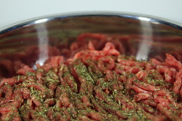 Minced meat and Provencal herbs in a skillet