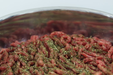 Minced meat and Provencal herbs in a skillet