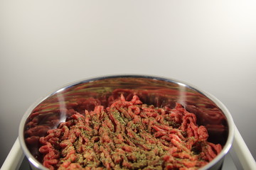 Minced meat and Provencal herbs in a skillet