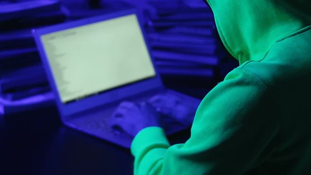 Malicious Hacker Writing Deleterious Program Code