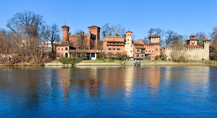 Fototapeta na wymiar medieval fortress in Valentino Park, Turin, Piedmont, Italy, bright blue sky spring morning on the Po river