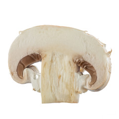 Fresh button mushrooms in a cut isolated on white. Close-up.