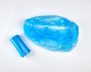 blue plastic bag for garbage on a white background