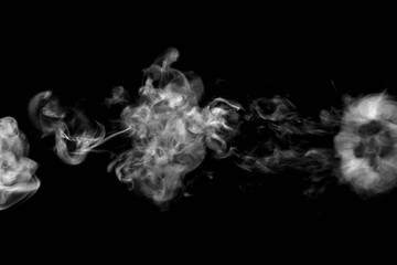 white smoke isolated on black background.