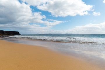 Panorama of beautiful beach and tropical sea of Lanzarote. Canaries