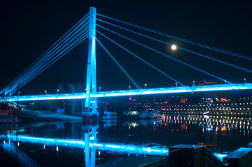 Tyumen, Russia, on April 19, 2019: The pedestrian cable-stayed bridge in Tyumen at night
