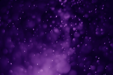 Obraz premium Bokeh purple proton background abstract