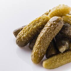 pickled vegetables on a white acrylic background