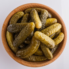 pickled vegetables on a white acrylic background