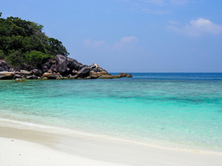 Paradise island blue sea and white beach with blue sky