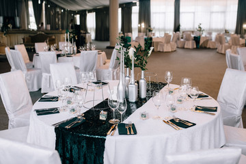 The wedding decor. The white flowers bouquet