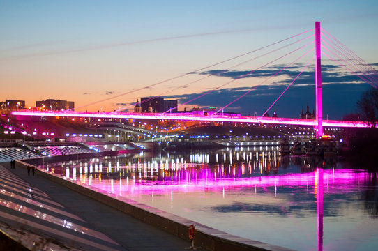 Tyumen, Russia, on April 19, 2019: A spring high water on the embankment in Tyumen in the evening.