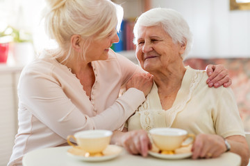 Senior woman spending quality time with her daughter