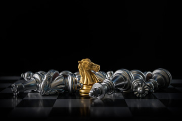 Chess (knight wins the game) on black background. Success, business strategy, victory, win, winner,...