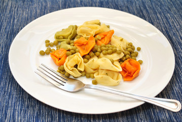 Tri-Colored Cheese Tortellini Cooked with Peas and Butter