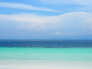 Shade of blue sea with blue sky