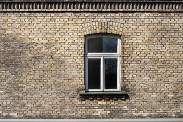 Obraz premium Walls and windows.Old brick wall with window.