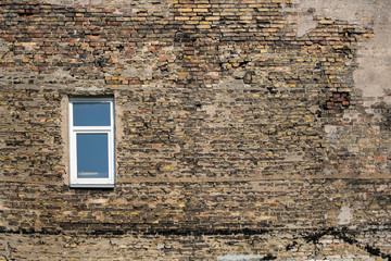 Walls and windows.Old brick wall with  window.