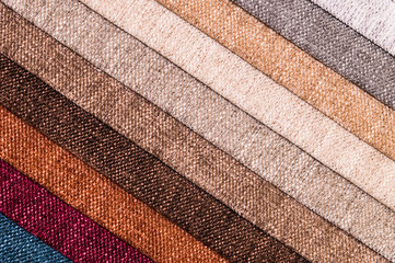 A set of samples of fabric furniture decoration lines of textile textures. Multicolored stripes upholstery. Tone for a luxurious interior style. Abstract background